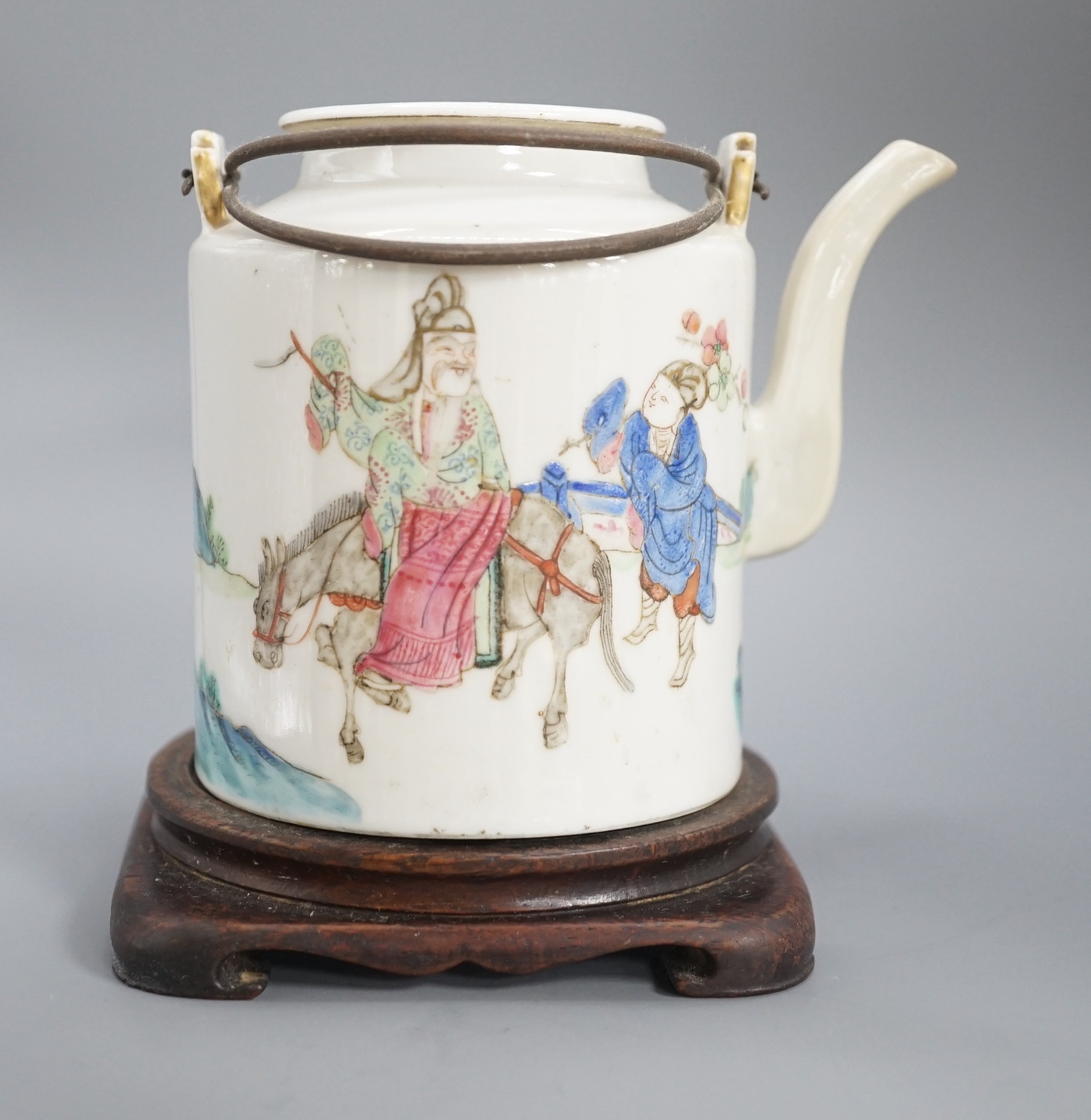 A Chinese famille rose cylindrical teapot and cover, 19th century 11cm, wood stand